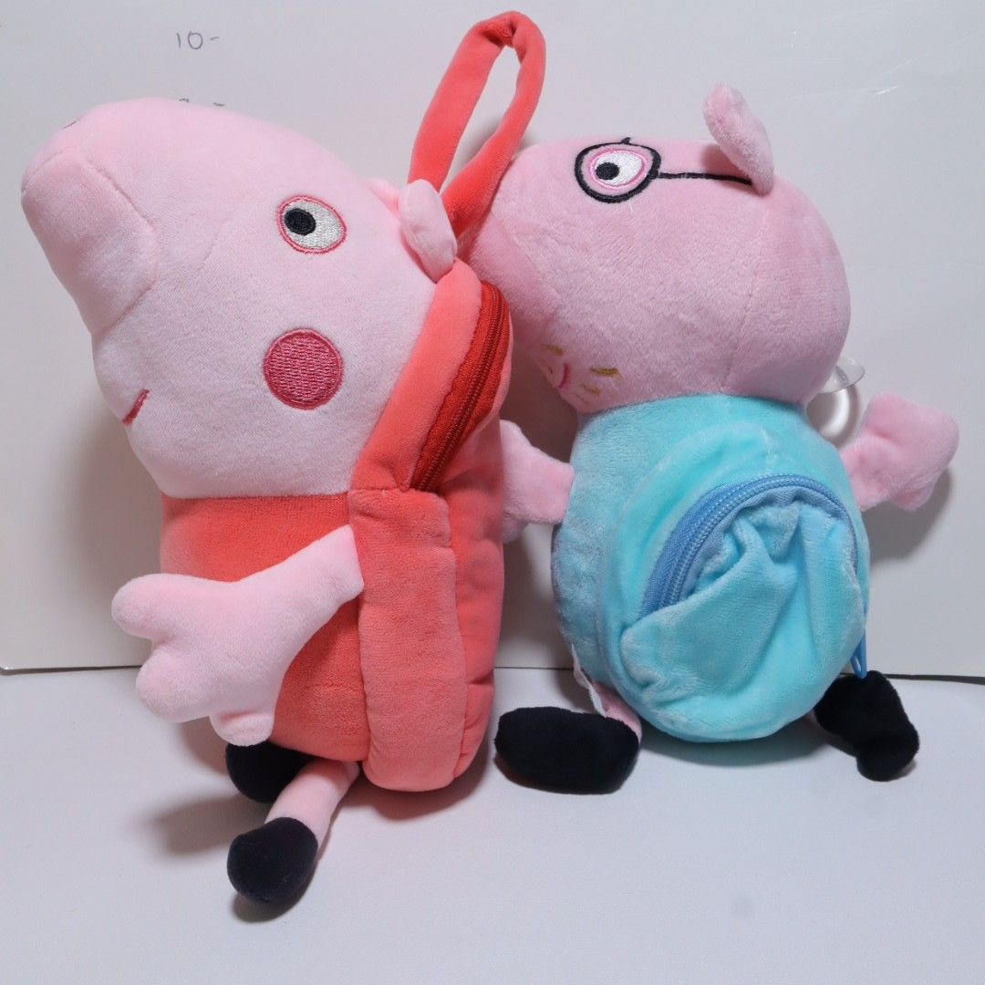Peppa Pig and Daddy Pig plush toy backpack (Category: Plushies & Soft Toys) located in Manila. Submitted by hzdeclutterstuffscollectionsph (Listing ID 1435744231, Image 1). Description: 🎒zippered pouch TAKE 2 for 250 ✅size: approx. 9-10" tall ✅items are sold AS IS. Check photos carefully and ask questions before purchasing. NO COD MOP: G•CASH/Cash on Pick up.