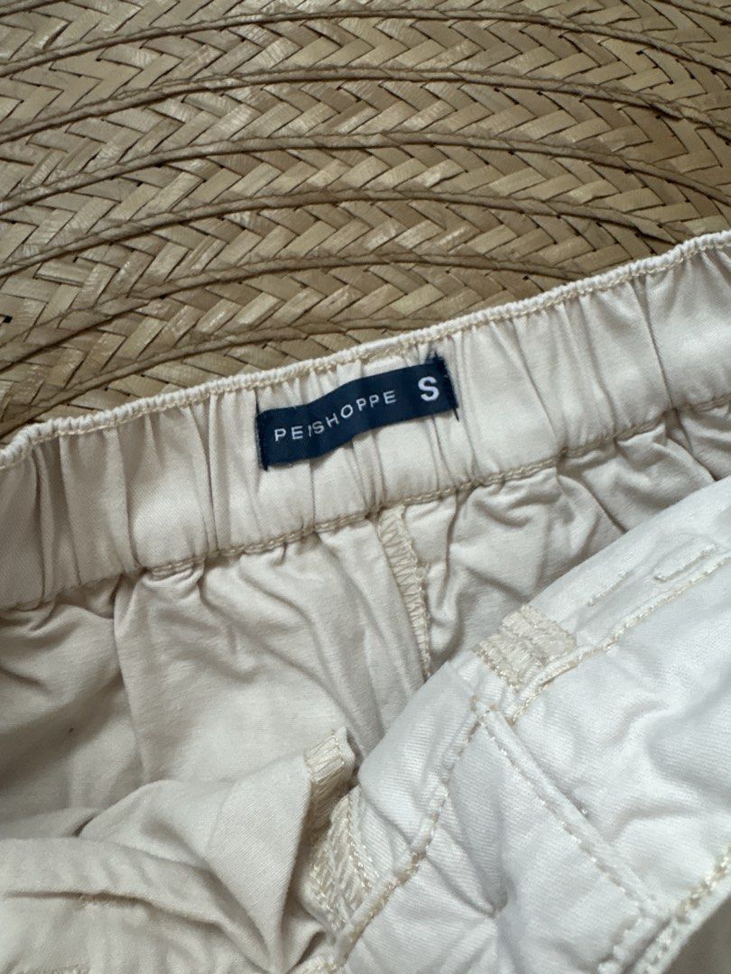 PE/SHOPPE Cargo Skirt - Size S (Category: Skirts) located in Manila. Submitted by _foryou (Listing ID 1435779627, Image 3). Description: - PE/SHOPPE Cream Cargo Skirt - Size: S - Features: - Multiple Pockets - Button Closure - Zipper Closure - Style: Casual - Material: Cotton Blend - Perfect for everyday wear.