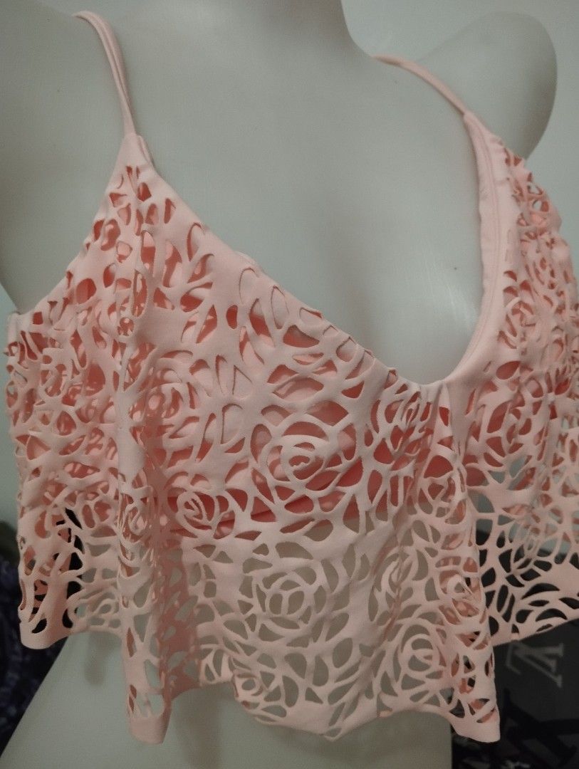 Pink Floral Cutout Bikini Top (Category: Bikinis & Swimsuits) located in Manila. Submitted by beckylafea (Listing ID 1435824854, Image 3). Description: - Pink bikini top - Floral cutout design - Halter neck - Tie back closure freesize - Layered design - Adjustable straps - Perfect for beach or pool.