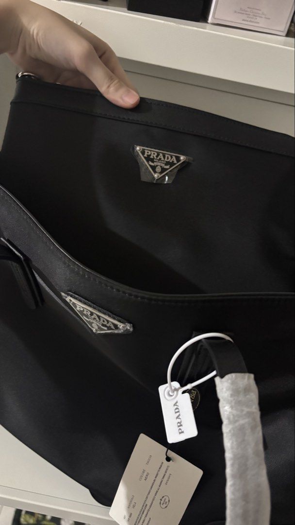 Prada Tote Bag with two small bags (Category: Luxury Bags & Wallets) located in Cavite. Submitted by declutteringthingzz (Listing ID 1435840530, Image 3). Description: Authentic Prada GWP Removed plastics packaging.