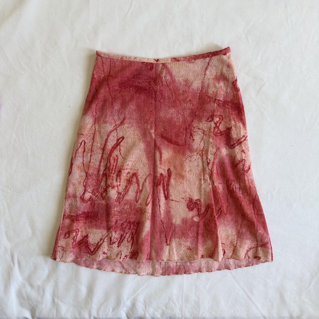 Printed A-line Skirt (Category: Skirts) located in Makati City. Submitted by haileysarchives (Listing ID 1435754881, Image 1). Description: - A-line skirt with a unique abstract print. - Features shades of red and beige. - Made of lightweight fabric. - Comfortable fit. - Suitable for various occasions. - Easy to pair with different tops and shoes..