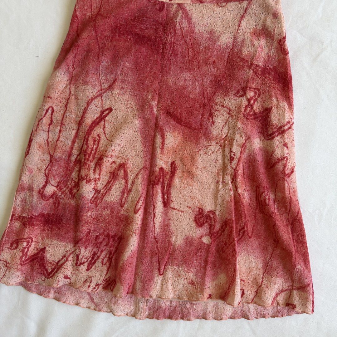 Printed A-line Skirt (Category: Skirts) located in Makati City. Submitted by haileysarchives (Listing ID 1435754881, Image 2). Description: - A-line skirt with a unique abstract print. - Features shades of red and beige. - Made of lightweight fabric. - Comfortable fit. - Suitable for various occasions. - Easy to pair with different tops and shoes..