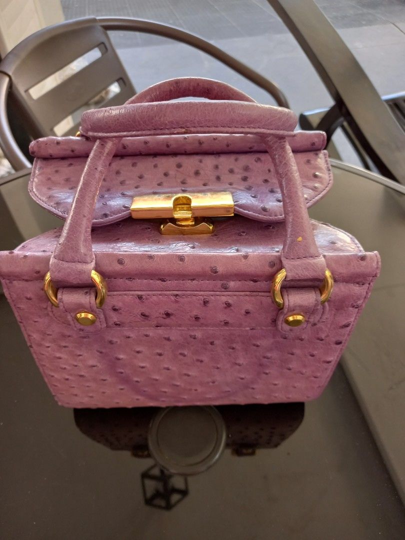 Purple Ostrich Leather Handbag (Category: Luxury Bags & Wallets) located in Tuguegarao City. Submitted by zenphoenix-7ad615 (Listing ID 1435792959, Image 3). Description: - Purple ostrich leather handbag - Structured design - Top handle - Gold-toned hardware - Clasp closure - Compact size.