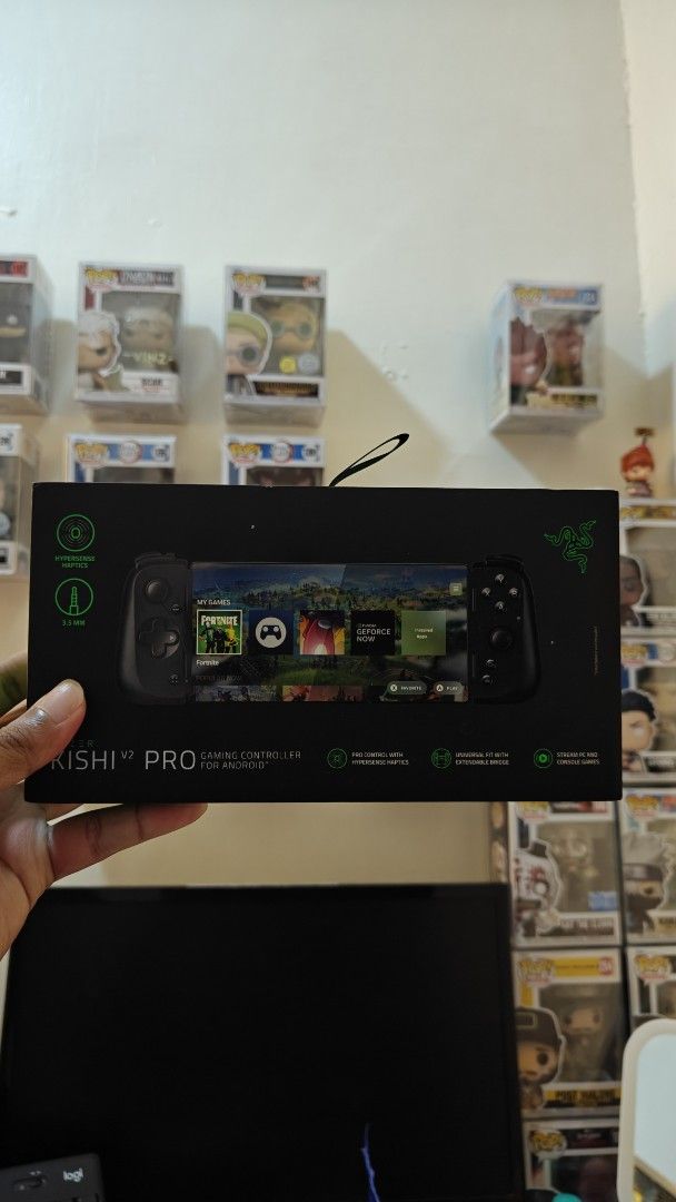 Razer Kishi Pro V2 Mobile Game Controller for Android (Category: Controllers) located in Manila. Submitted by 24paul0735588 (Listing ID 1435763263, Image 1). Description: Razer Kishi Pro V2 mobile game controller for android. The box shows the controller and its features. The controller is black and has a sleek design. The box also indicates it is a mobile game controller. Barely used PM for any questions .