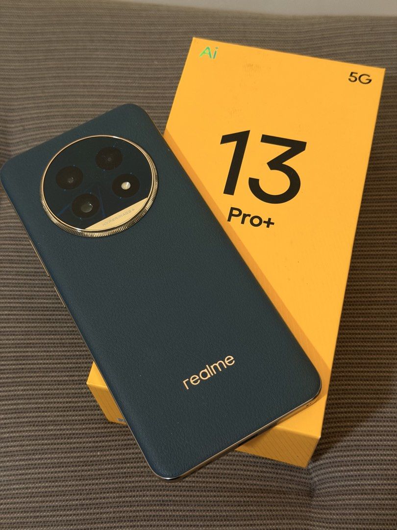 realme 13 Pro+ 5G (Category: Realme) located in Pasig City. Submitted by mrgoodasnewgadgets (Listing ID 1435737369, Image 3). Description: Good as New Used only in unboxing / review Processor: Qualcomm Snapdragon 7s Gen 2 (4nm) with Adreno 710 GPU. Display: 6.7-inch FHD+ Curved OLED, 120Hz refresh rate, and a peak brightness of 2000 nits. It features Corning Gorilla Glass 7i protection and “Rainwater Smart Touch” for use with wet hands. Camera Sy