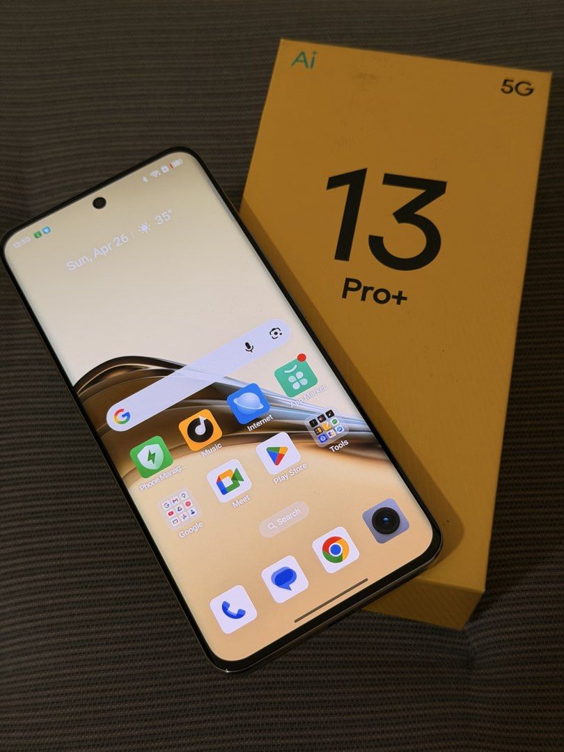 realme 13 Pro+ 5G (Category: Realme) located in Pasig City. Submitted by mrgoodasnewgadgets (Listing ID 1435737369, Image 2). Description: Good as New Used only in unboxing / review Processor: Qualcomm Snapdragon 7s Gen 2 (4nm) with Adreno 710 GPU. Display: 6.7-inch FHD+ Curved OLED, 120Hz refresh rate, and a peak brightness of 2000 nits. It features Corning Gorilla Glass 7i protection and “Rainwater Smart Touch” for use with wet hands. Camera Sy