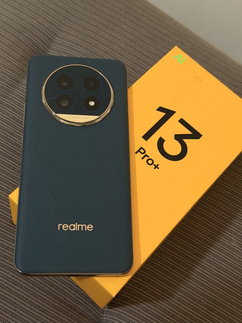 realme 13 Pro+ 5G (Category: Realme) located in Pasig City. Submitted by mrgoodasnewgadgets (Listing ID 1435737369, Image 1). Description: Good as New Used only in unboxing / review Processor: Qualcomm Snapdragon 7s Gen 2 (4nm) with Adreno 710 GPU. Display: 6.7-inch FHD+ Curved OLED, 120Hz refresh rate, and a peak brightness of 2000 nits. It features Corning Gorilla Glass 7i protection and “Rainwater Smart Touch” for use with wet hands. Camera Sy