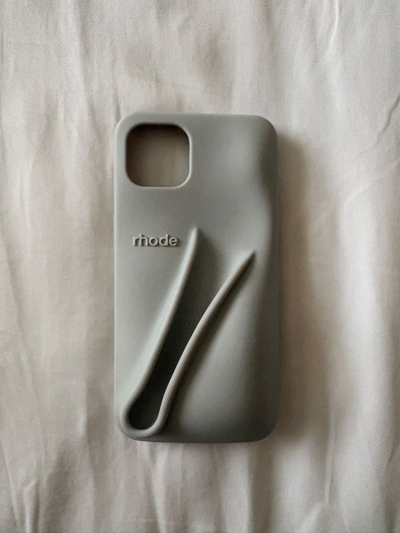 Rhode Phone Case (Category: Cases & Sleeves) located in Manila. Submitted by yna.items (Listing ID 1435783033, Image 2). Description: - Case is good as new - Guaranteed authentic - Compatible with iPhone 13 - Box has obvious signs of wear, but item itself is good as new - RFS: Not using anymore .