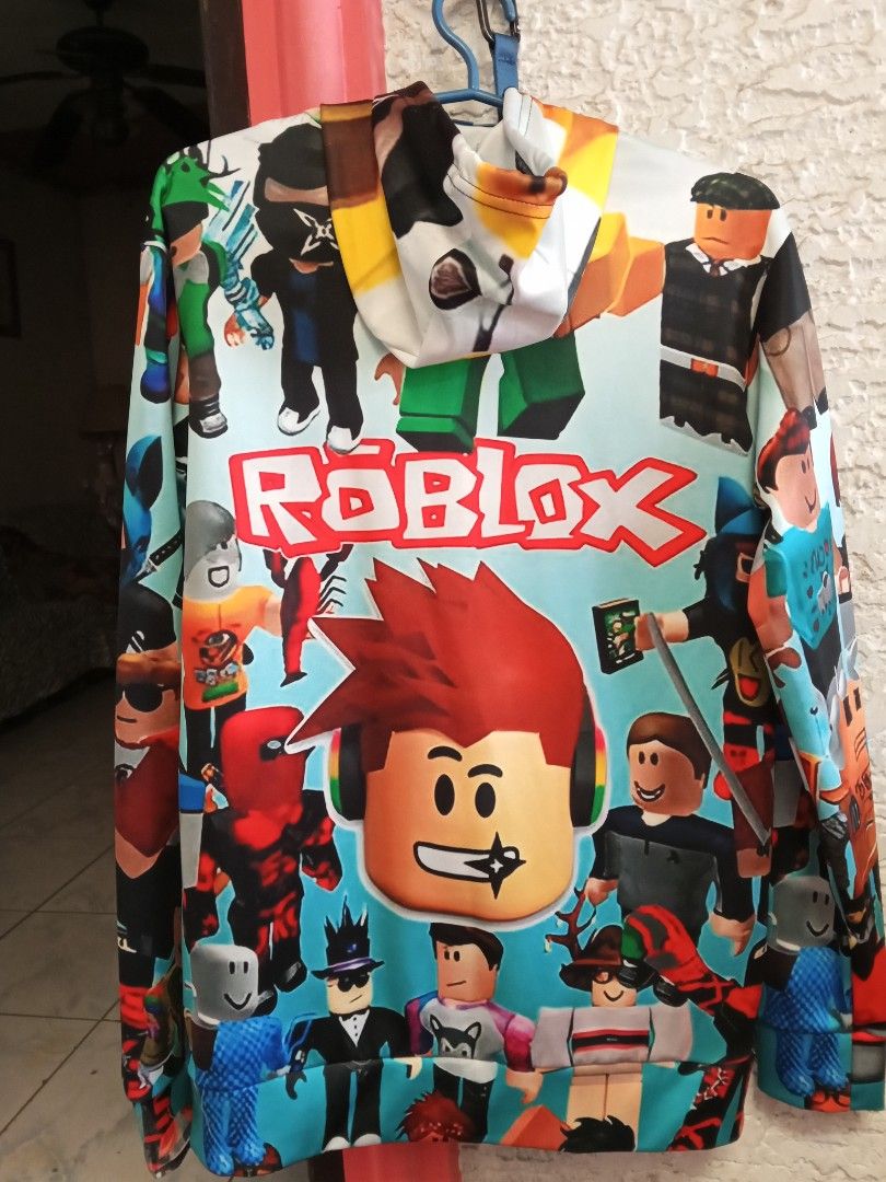 Roblox Hoodie (Category: Coats, Jackets and Outerwear) located in Cavite. Submitted by ronessabrandedshoes2ndaccount (Listing ID 1435759294, Image 2). Description: - Roblox design hoodie - Full-zip closure - Hood with drawstrings - Features Roblox characters and logo - Measurements: 16 inches (chest), 20 inches (length).