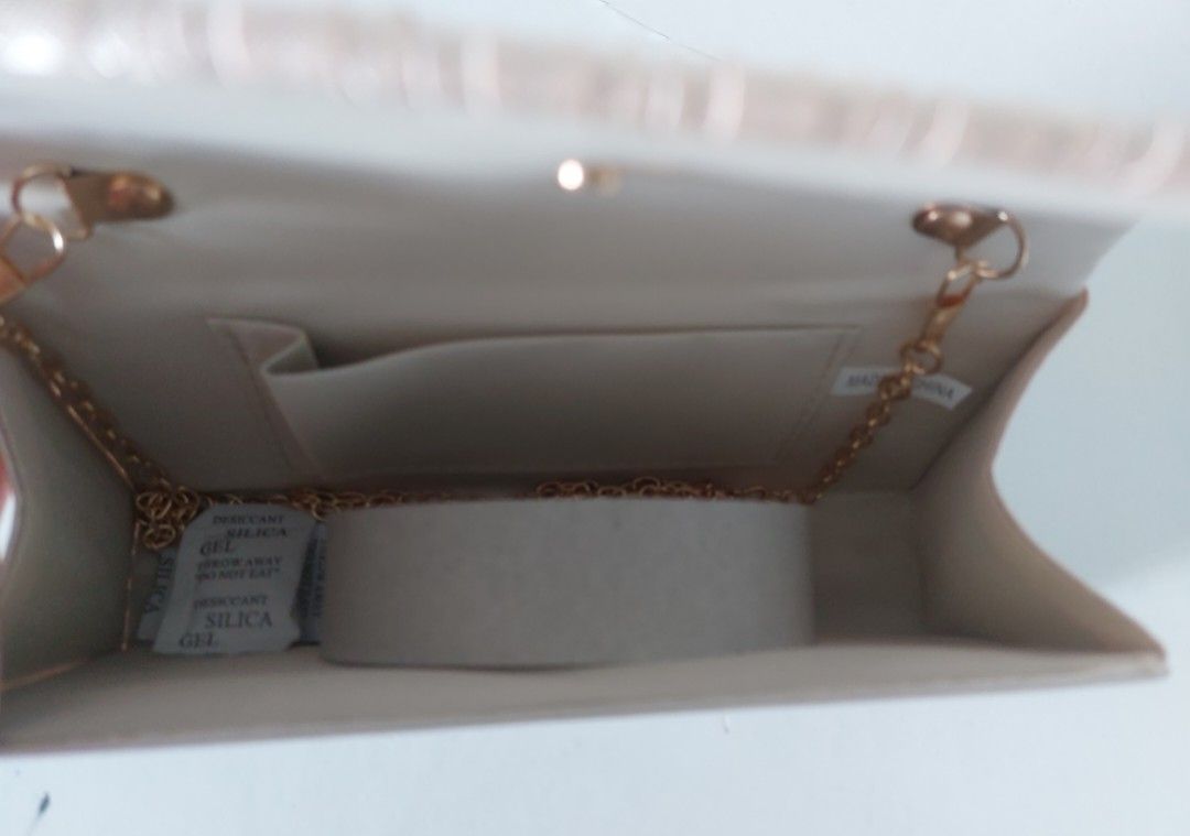 Silk Clutch Party Bag | Champagne (Category: Clutches) located in Makati City. Submitted by missinnahco (Listing ID 1435822512, Image 2). Description: ✨️ Elegant silk clutch bag with a pleated design ✨️ With free sling chain ✨️ Perfect for weddings, anniversaries and parties.