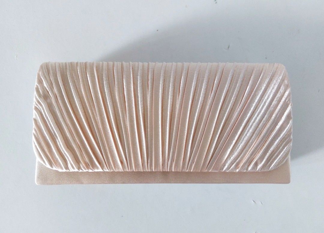 Silk Clutch Party Bag | Champagne (Category: Clutches) located in Makati City. Submitted by missinnahco (Listing ID 1435822512, Image 1). Description: ✨️ Elegant silk clutch bag with a pleated design ✨️ With free sling chain ✨️ Perfect for weddings, anniversaries and parties.