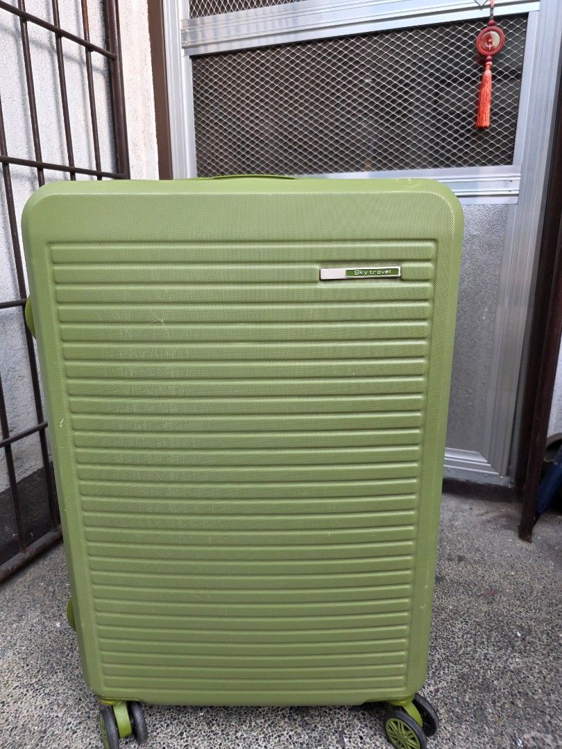 Sky Travel Green Hard Shell Luggage (Category: Luggage) located in Caloocan City. Submitted by mylenenm (Listing ID 1435829381, Image 2). Description: Green hard shell luggage. Medium size with multiple compartments, handle, wheels, and a secure lock. Modern design, perfect for travel..