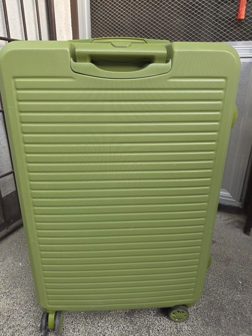 Sky Travel Green Hard Shell Luggage (Category: Luggage) located in Caloocan City. Submitted by mylenenm (Listing ID 1435829381, Image 3). Description: Green hard shell luggage. Medium size with multiple compartments, handle, wheels, and a secure lock. Modern design, perfect for travel..