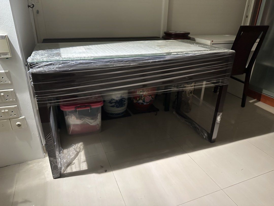 Solid Study table (Category: Tables & Sets) located in Singapore. Submitted by 2hot4u29 (Listing ID 1435855984, Image 3). Description: Study desk table with 3 drawers Customised glass top for table included . Will include one wooden chair Height 75cm Length 125cm Width 58cm $99 Please use own mover or lalamove ..