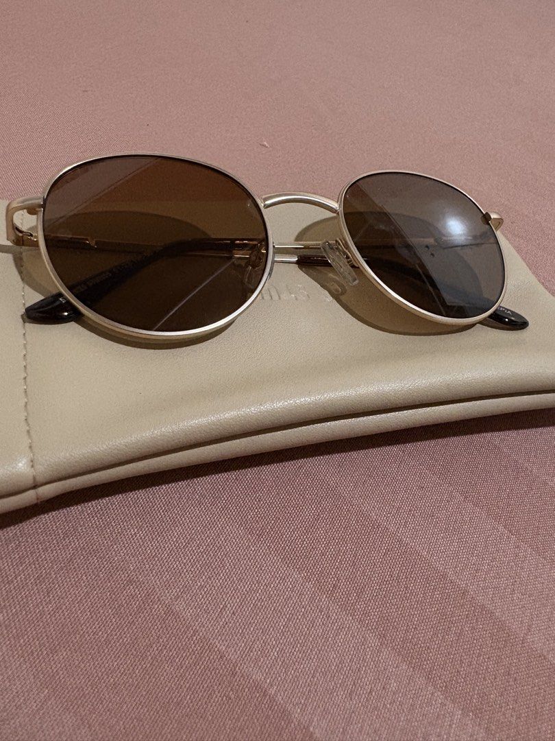 Sunnies Studios Jett Round Sunglasses (Category: Sunglasses & Eyewear) located in Rizal. Submitted by _avvv (Listing ID 1435842494, Image 2). Description: - Only used once !! - Round shape - Gold frame - Sepia lenses - Includes beige protective case - Suitable for men and women comes with : •shades itself • original cloth • pouch.
