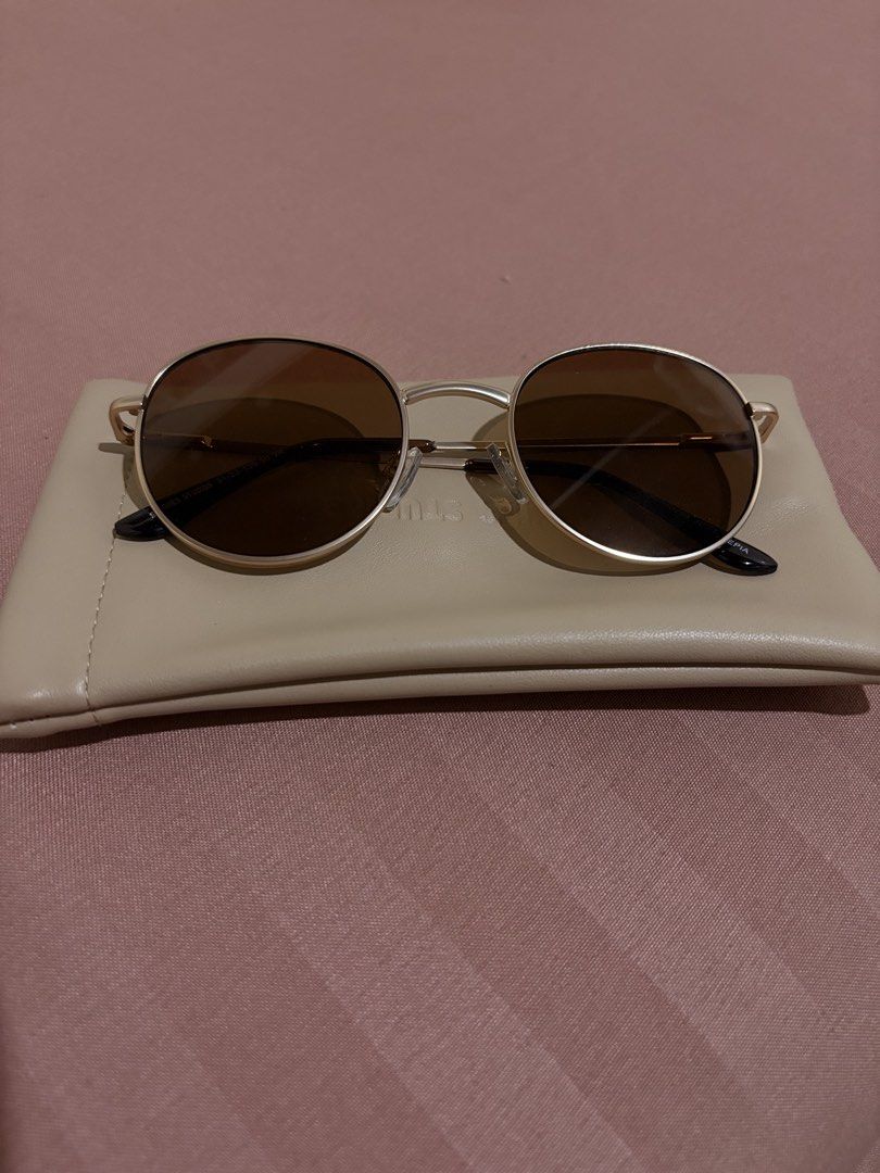 Sunnies Studios Jett Round Sunglasses (Category: Sunglasses & Eyewear) located in Rizal. Submitted by _avvv (Listing ID 1435842494, Image 1). Description: - Only used once !! - Round shape - Gold frame - Sepia lenses - Includes beige protective case - Suitable for men and women comes with : •shades itself • original cloth • pouch.