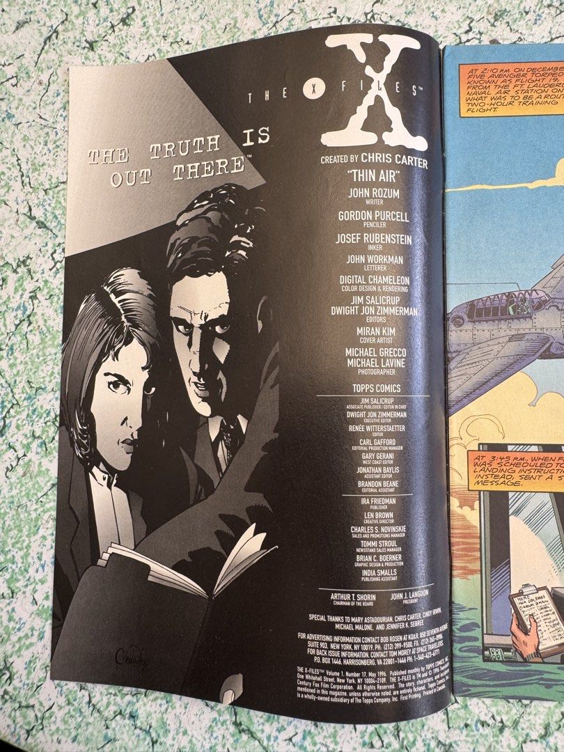 The X-Files Comic Book #17 (Category: Comics & Manga) located in San Juan City. Submitted by redgecollection (Listing ID 1435767931, Image 2). Description: For UFO and X-Files collectors: - The X-Files comic book issue #17. - Story: "Thin Air". - Publisher: Topps Comics. - Cover: Mulder and Scully with a WWII Navy pilot. - Storyline: A pilot lost in the Bermuda Triangle. - Includes creators and contributors..