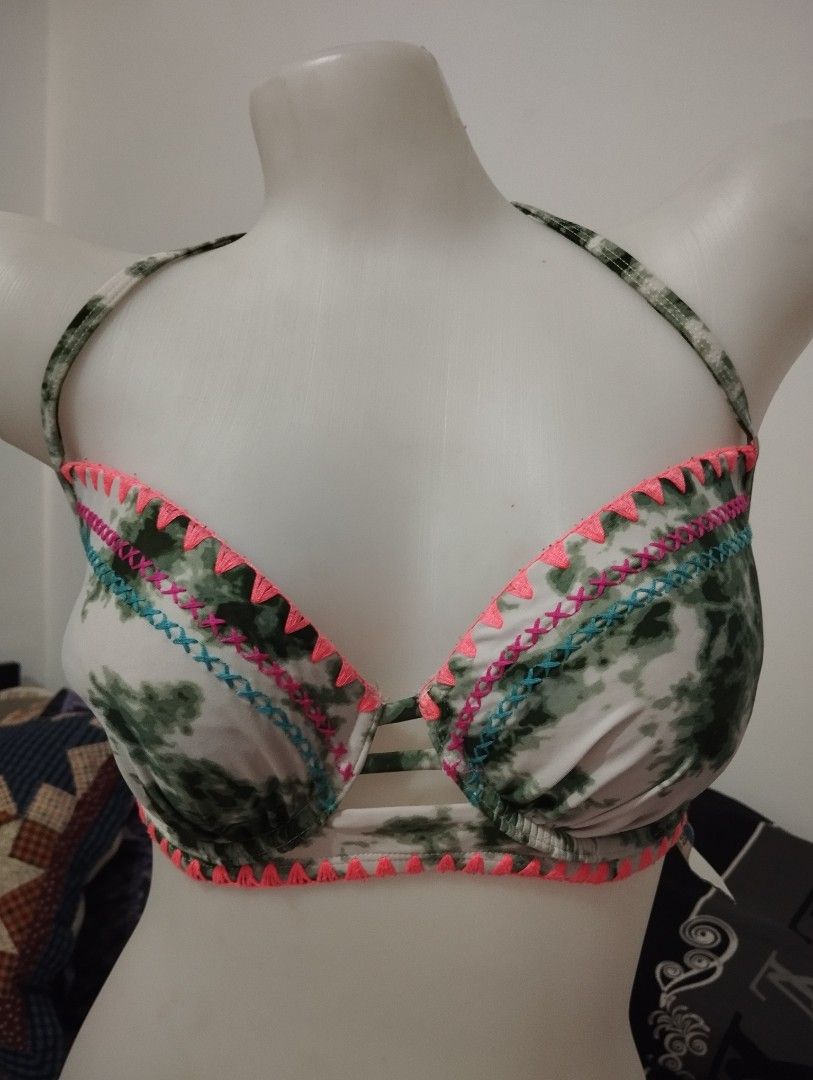 Tie-dye Bikini Top with Crochet Trim (Category: Bikinis & Swimsuits) located in Manila. Submitted by beckylafea (Listing ID 1435824553, Image 1). Description: - Tie-dye bikini top - Pink and blue crochet trim - Halter neck style - Tie closure at back 38d - Unique cut-out design - Soft, lightweight fabric - Perfect for beach or pool.