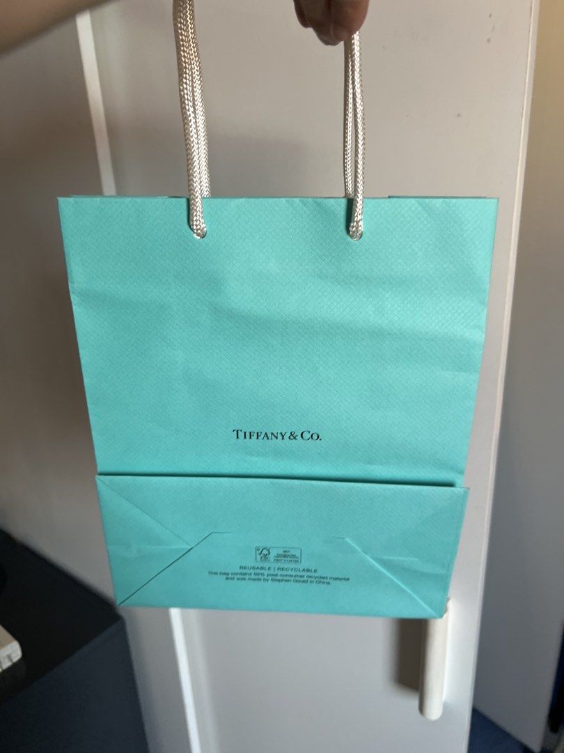 Tiffany & Co. Paper Bag (Category: Luxury Bags & Wallets) located in Makati City. Submitted by marckyboy (Listing ID 1435815355, Image 2). Description: - Authentic Tiffany & Co. paper bag - Classic Tiffany blue color - Features the Tiffany & Co. logo - Includes white rope handles - Reusable and recyclable.
