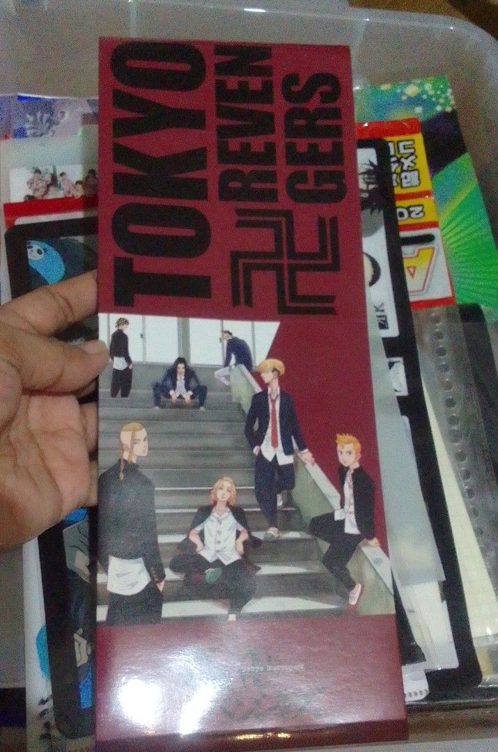 Tokyo Revengers Manga box only (Category: Comics & Manga) located in Santa Rosa. Submitted by animemerchcollection (Listing ID 1435780446, Image 1). Description: - Tokyo Revengers bookmark - Features series title and characters - Maroon background - Rectangular shape - Made of cardstock or similar material - Great for fans!.