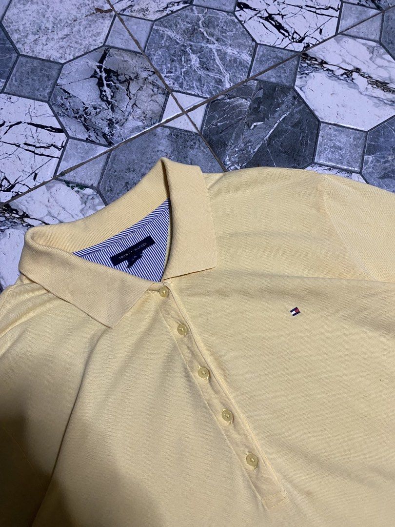 Tommy Hilfiger Poloshirt womens (Category: Others Tops) located in Cebu City. Submitted by kalong210 (Listing ID 1435834905, Image 3). Description: Tommy hilfiger Polo shirt womens Excellent condition Size: M on tag Best fit Large Dimes: L 27 W 22 Last pic issue .