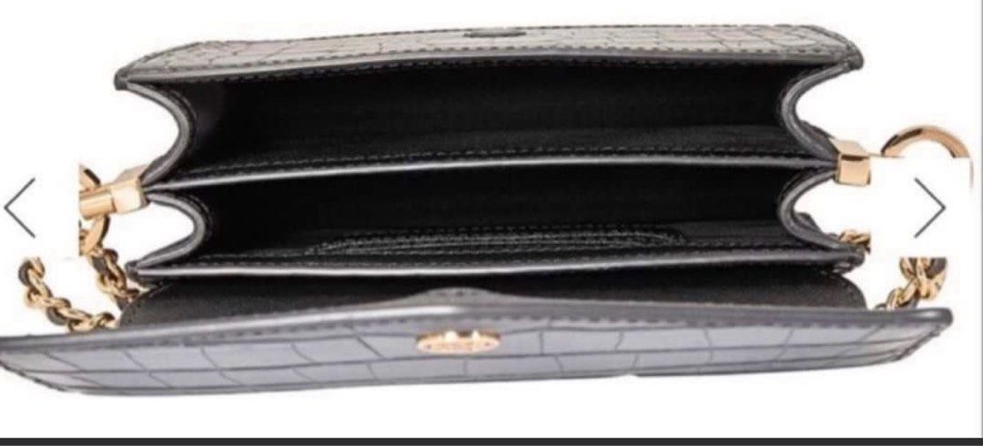Tory Burch Black Croc-Embossed Crossbody Bag (Category: Cross-body Bags) located in Majayjay. Submitted by Ash.Shop.wise (Listing ID 1435763257, Image 3). Description: - Tory Burch crossbody bag - Black croc-embossed exterior - Gold chain strap - Flap closure with gold logo - Multiple interior compartments - Detachable strap - Perfect for everyday or special occasions Tory Burch robinson croc embossed convertible 💯Original and brand new On hand 
