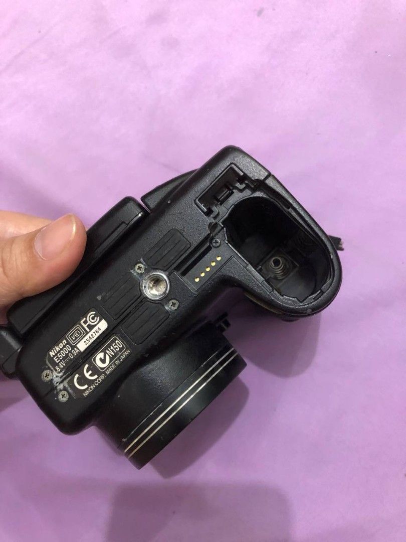 UNTESTED!!! Nikon Coolpix 5000 Digital Camera (Category: Cameras) located in Manila. Submitted by mochii1221 (Listing ID 1435903749, Image 3). Description: - Nikon Coolpix 5000 digital camera - Features a Zoom Nikkor lens - Built-in flash - Flip-out LCD screen - SD card slot - Battery cover is missing but you can tie it with ponytail if you had the battery - uses nikon EN-EL1 battery buy at your own risk no refund, no replace, return.
