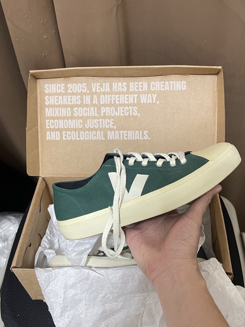 Veja Wata II Low Canvas Sneakers (Category: Sneakers) located in Makati City. Submitted by capuchinoo000 (Listing ID 1435783988, Image 1). Description: - Veja Wata II Low Canvas sneakers - Color: Green - Features white "V" logo - Cream-colored sole - Size: 42 EU / 9 UK / 27 cm - Includes original box - Made with ecological materials.