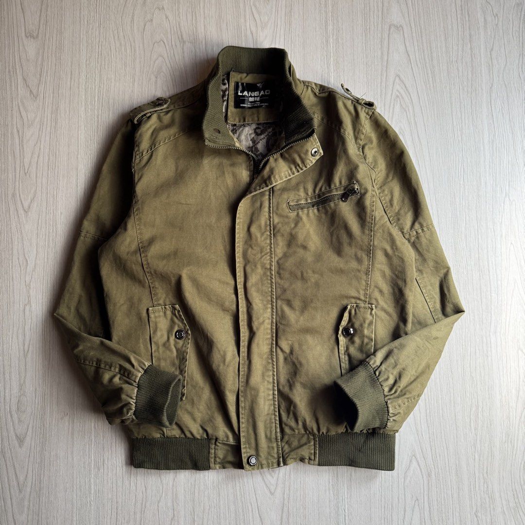 Vintage Langao Military Bomber Jacket (Category: Coats, Jackets and Outerwear) located in Zamboanga. Submitted by rustic.rev (Listing ID 1435729986, Image 2). Description: Vintage Langao Military Bomber Jacket In very good condition, misaligned snap button (last photo) Tagged: XL Actual Measurement: Width: 22” Length: 26” Shoulder: 17” Sleeves: 24” ₱800 Dm or comment “mine” to purchase 📩🫶🏻.