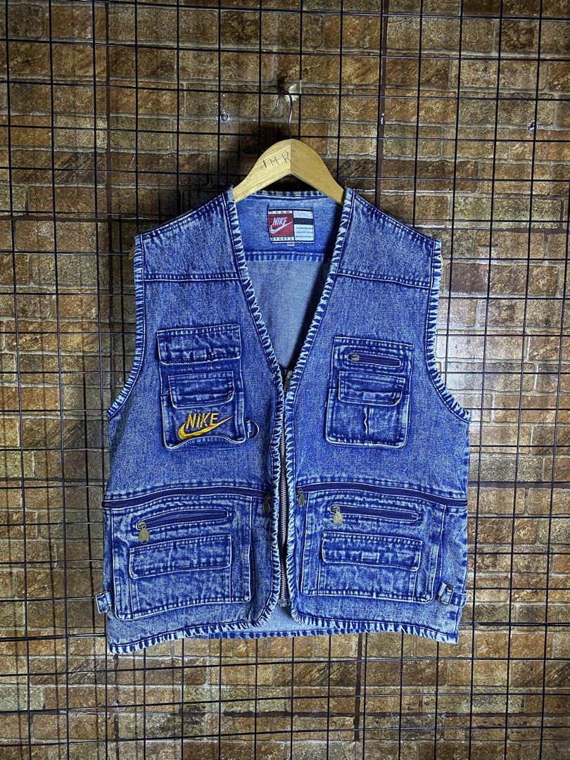 Vintage Nike Multi Pocket Denim Vest (Category: Vests) located in Makati City. Submitted by earnx_ (Listing ID 1435731525, Image 1). Description: Vintage Nike Multi Pocket Denim Vest - Dimension is 20x23 - Issue on zipper only - All zippers are smooth and working .