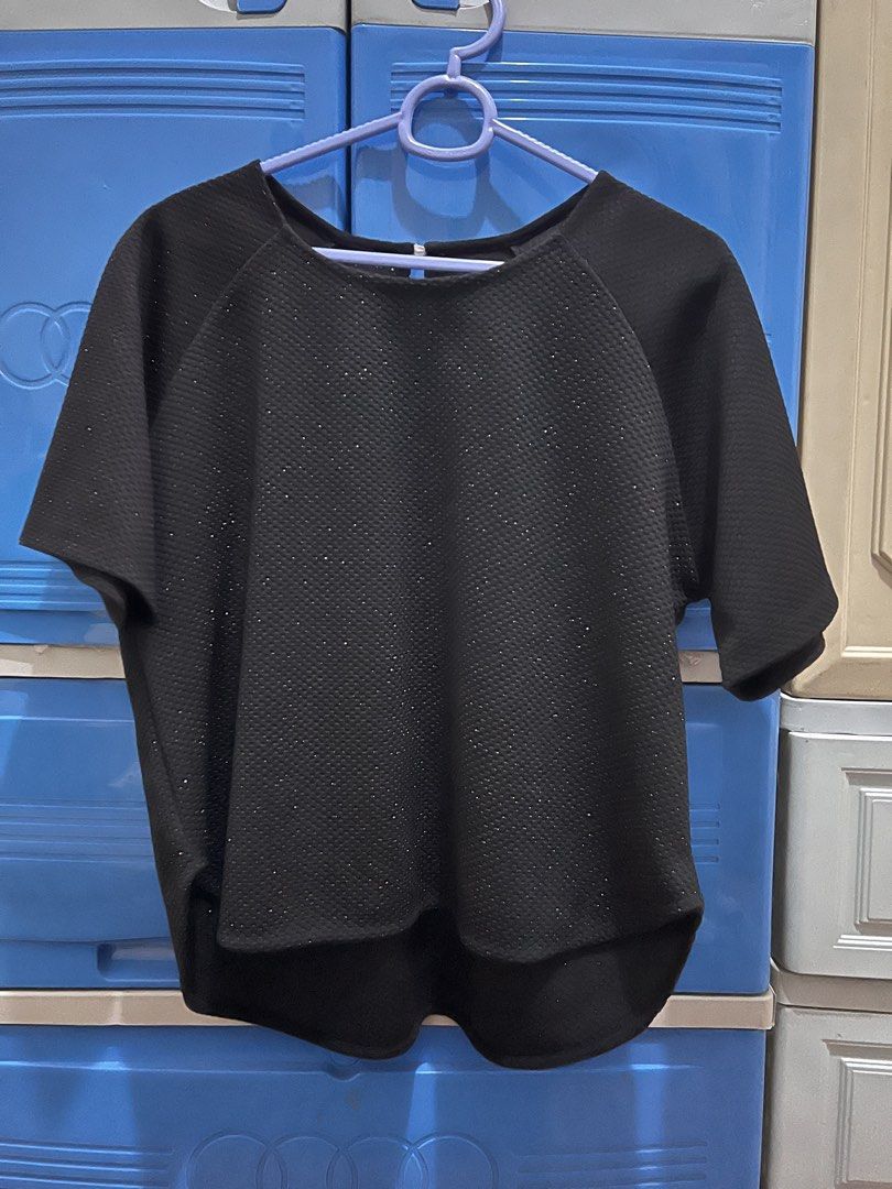 Waffle Knit black blouse (Category: Blouses) located in Manila. Submitted by jovalbarez (Listing ID 1435847633, Image 1). Description: Note: Fabric is very thick and is slightly glittery / sparkly. Can provide video upon request. Already in last price. Item is from Santa Lucia, Pasig. Delivery to be shouldered by buyer. Available for Makati meetup on weekdays..