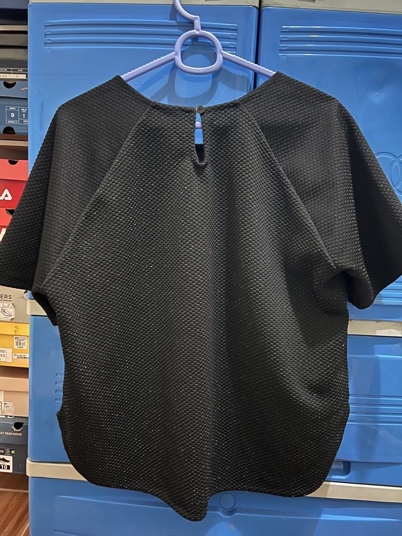 Waffle Knit black blouse (Category: Blouses) located in Manila. Submitted by jovalbarez (Listing ID 1435847633, Image 3). Description: Note: Fabric is very thick and is slightly glittery / sparkly. Can provide video upon request. Already in last price. Item is from Santa Lucia, Pasig. Delivery to be shouldered by buyer. Available for Makati meetup on weekdays..