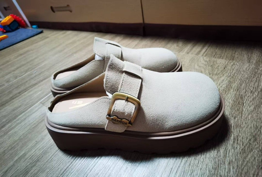 Warrior Platform Clogs - Beige (Category: Sneakers & Footwear) located in Singapore. Submitted by caroline_sun (Listing ID 1435842821, Image 1). Description: - Stylish Warrior platform clogs - Neutral beige color - Buckle detail - Platform sole for added height and comfort - Excellent condition - Minimal signs of wear - Perfect for everyday wear.