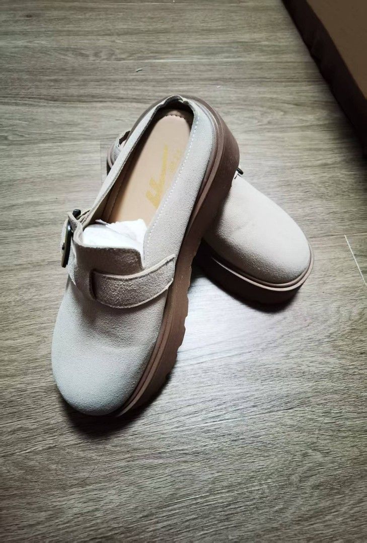 Warrior Platform Clogs - Beige (Category: Sneakers & Footwear) located in Singapore. Submitted by caroline_sun (Listing ID 1435842821, Image 2). Description: - Stylish Warrior platform clogs - Neutral beige color - Buckle detail - Platform sole for added height and comfort - Excellent condition - Minimal signs of wear - Perfect for everyday wear.