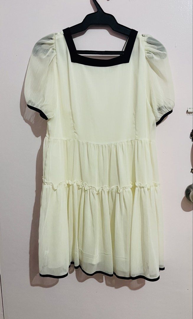 Cream White Dress with Black Trim (Category: Dresses) located in Angeles City. Submitted by hansu.j (Listing ID 1435828186, Image 3). Description: - Cream white dress - Square neckline - puff sleeves with black trim - Tiered skirt - Lightweight, flowy fabric - Medium sized.
