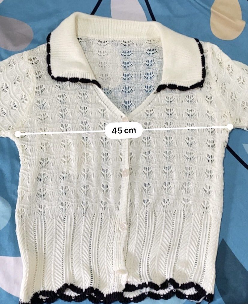 White Knit Cardigan with Black Trim (Category: Others Tops) located in Makati City. Submitted by beaa24 (Listing ID 1435804822, Image 2). Description: Very stretchable. No when worn photo. No issues.