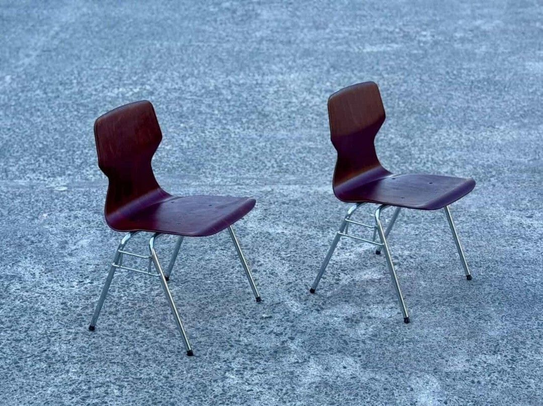 Wooden Chairs with Chrome Legs (Category: Chairs) located in Valenzuela. Submitted by upcycle_things (Listing ID 1435779356, Image 3). Description: - Set of 2 wooden chairs - Unique backrest design - Dark wood finish - Sturdy chrome legs - Well-maintained condition - Suitable for dining, office, or any space.
