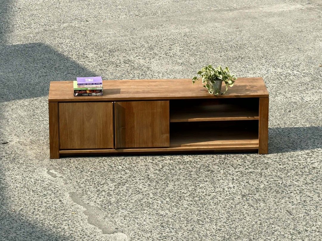 Wooden TV Console with Shelves (Category: TV Consoles) located in Valenzuela. Submitted by upcycle_things (Listing ID 1435730907, Image 1). Description: Wooden TV console with two doors and open shelves. Features a natural wood finish. The console has two doors on the left side and open shelving on the right. Perfect for organizing media and displaying decor..