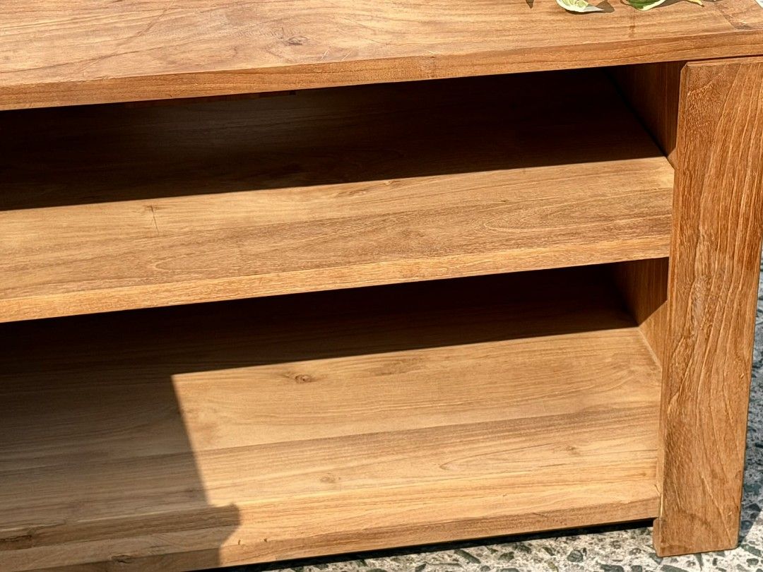 Wooden TV Console with Shelves (Category: TV Consoles) located in Valenzuela. Submitted by upcycle_things (Listing ID 1435730907, Image 3). Description: Wooden TV console with two doors and open shelves. Features a natural wood finish. The console has two doors on the left side and open shelving on the right. Perfect for organizing media and displaying decor..