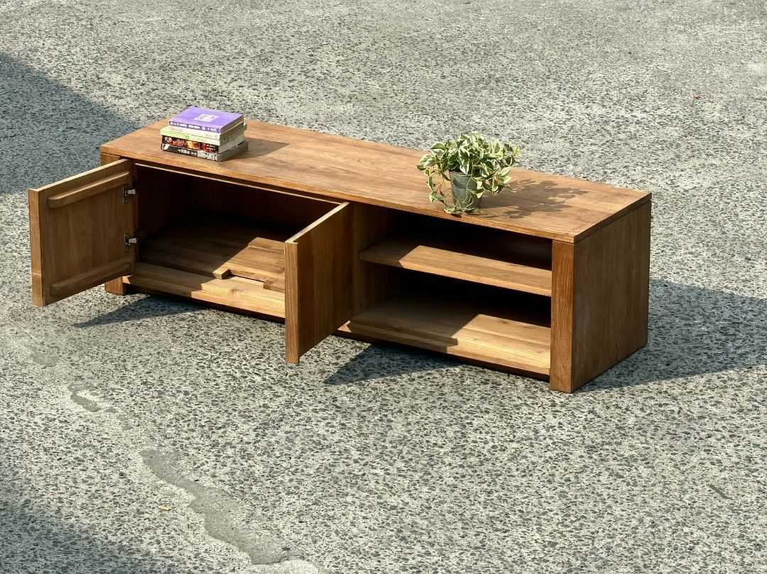 Wooden TV Console with Shelves (Category: TV Consoles) located in Valenzuela. Submitted by upcycle_things (Listing ID 1435730907, Image 2). Description: Wooden TV console with two doors and open shelves. Features a natural wood finish. The console has two doors on the left side and open shelving on the right. Perfect for organizing media and displaying decor..