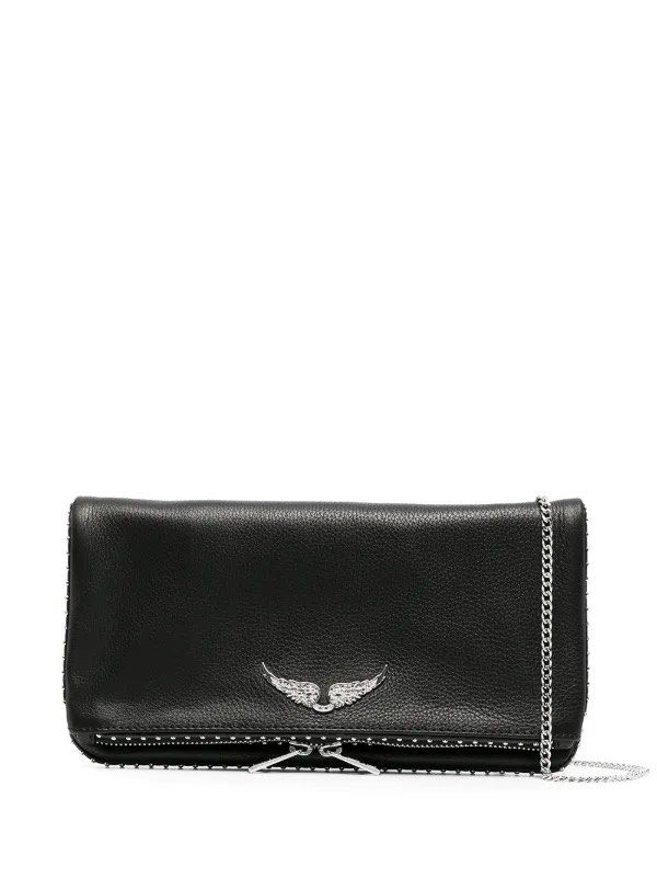 ZADIG&VOLTAIRE Rock Bag (Bought in Spain) (Category: Luxury Bags & Wallets) located in Pasig City. Submitted by outletfindsbyara (Listing ID 1435745215, Image 1). Description: THE DETAILS Black leather studded clutch bag from Zadig & Voltaire featuring silver-tone hardware, an internal logo patch, rounded stud embellishments, a top zip fastening, a foldover top with magnetic closure and a silver-tone logo plaque. Made in Italy Composition Outer: 