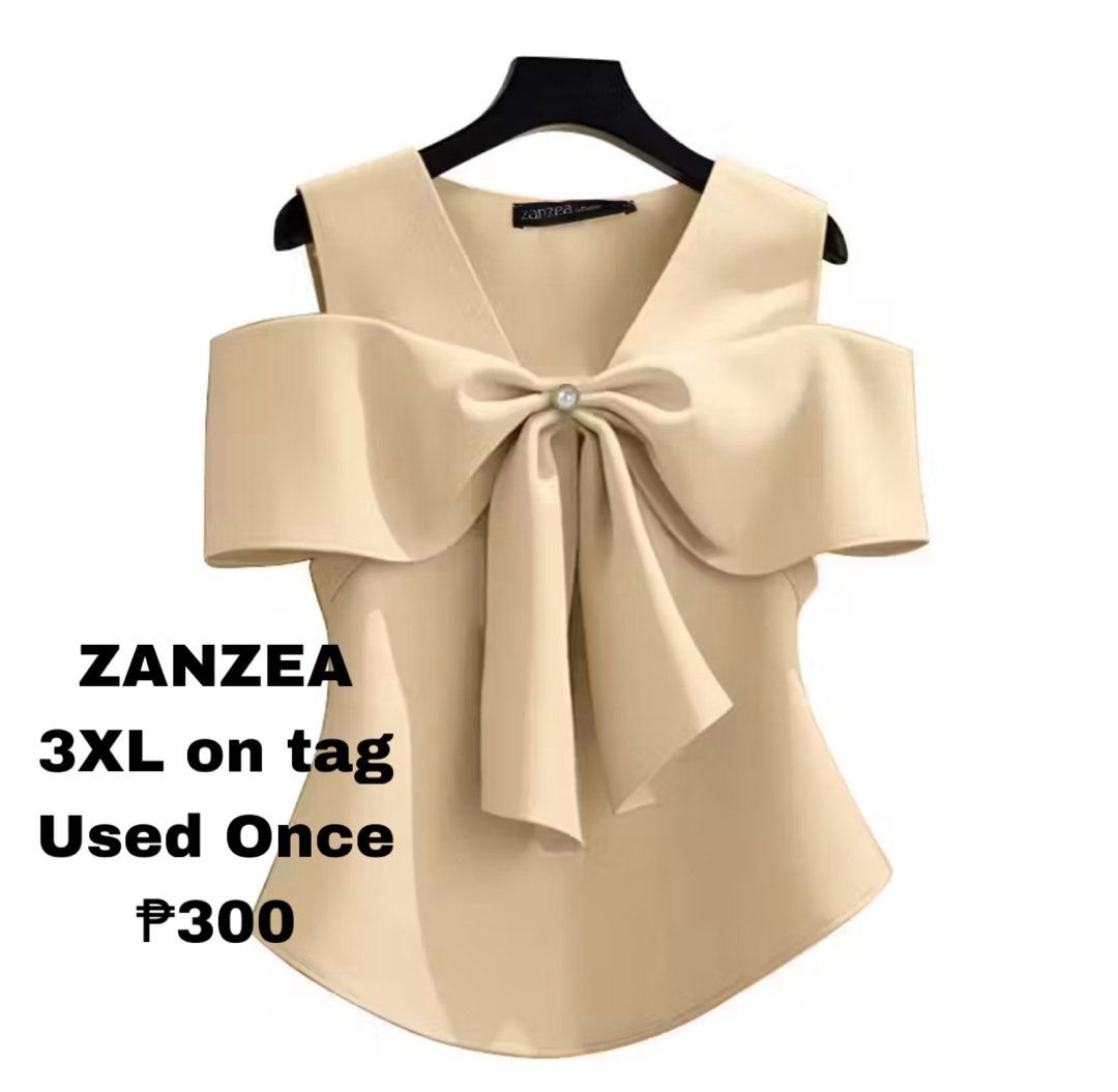 ZANZEA Bow Detail Top - 3XL (Category: Blouses) located in Santo Niño. Submitted by nicoleshane19 (Listing ID 1435805985, Image 1). Description: - ZANZEA top - Size: 3XL - Color: Light beige - Design: Off-shoulder with bow detail - Condition: Worn once - Perfect for special occasions.