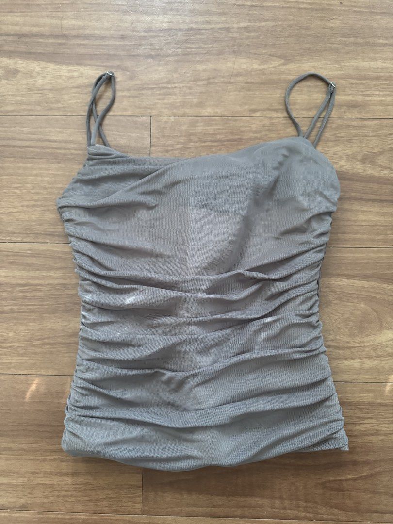 Zara Ruched Top (Category: Blouses) located in Manila. Submitted by iyacstnd (Listing ID 1435910470, Image 1). Description: Zara Ruched Corset Top in Mink - worn once only - color is leaning on muted mauve pink in person - fits xs-small frames - has actual deboning in front - fabric is still in pristine condition, zipper is still working - only flaw is the wire (boning structure) is lumalabas (but can still be fixed) - price is nego (no to lowbal