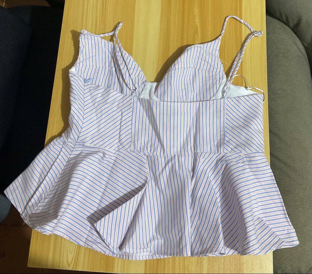 Zara Striped Bustier Top (Category: Sleeveless) located in Cabuyao City. Submitted by declutter_w_mee (Listing ID 1435844650, Image 2). Description: - Zara bustier top - Striped pattern - Adjustable spaghetti straps - Sweetheart neckline - Peplum hem - Back closure - Lightweight cotton blend - Size tag visible.