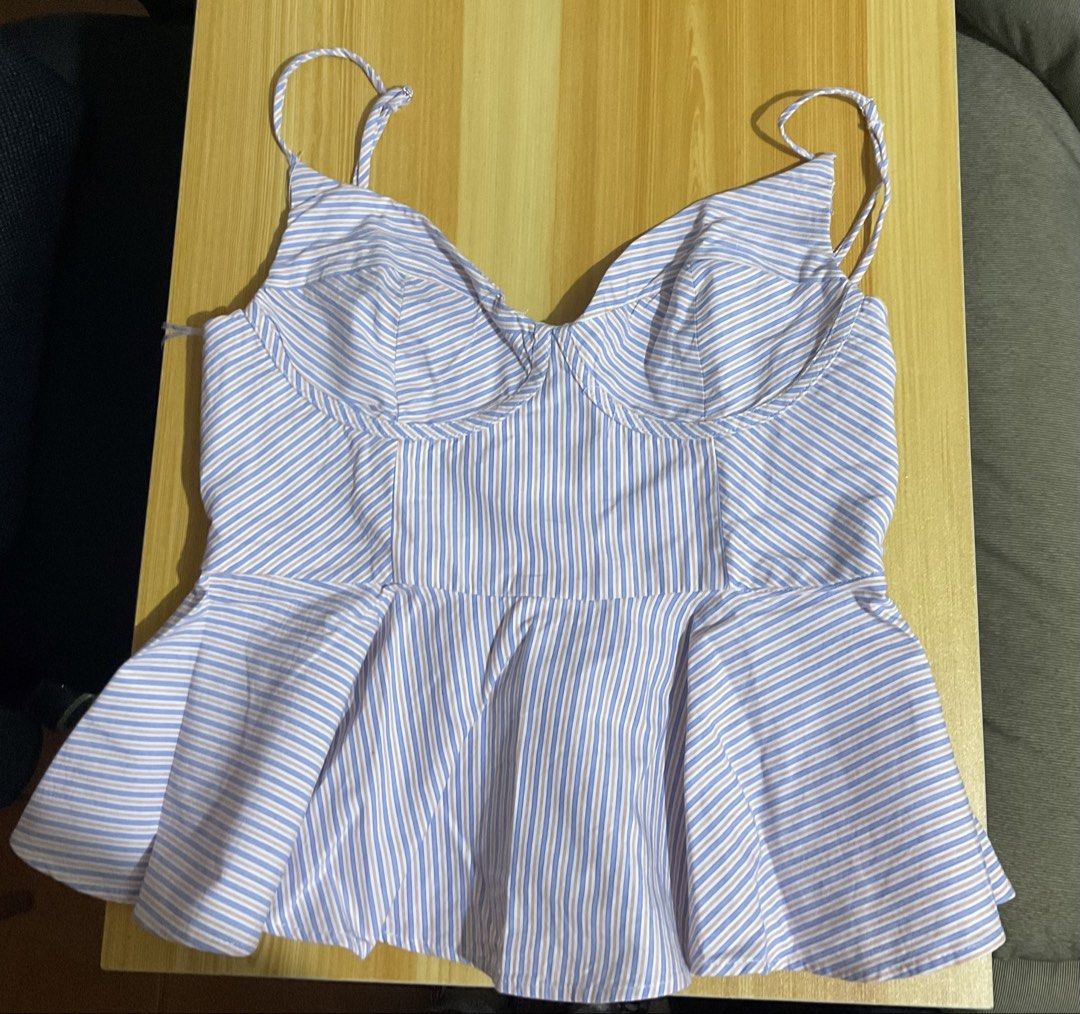 Zara Striped Bustier Top (Category: Sleeveless) located in Cabuyao City. Submitted by declutter_w_mee (Listing ID 1435844650, Image 1). Description: - Zara bustier top - Striped pattern - Adjustable spaghetti straps - Sweetheart neckline - Peplum hem - Back closure - Lightweight cotton blend - Size tag visible.
