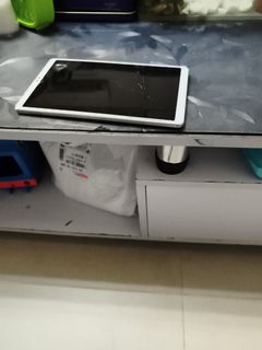 White Tablet Computer with Cracked Screen475730088371179520