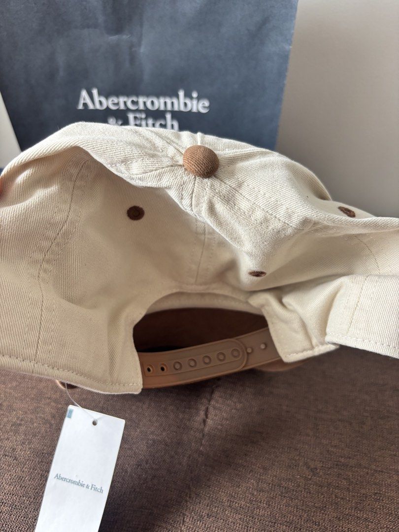 Abercrombie & Fitch x Coors Cap (Category: Caps & Hats) located in Quezon City. Submitted by authenkicks (Listing ID 1440809799, Image 3). Description: - Authentic Abercrombie & Fitch cap - Features iconic Coors cowboy design - Stylish two-tone: tan brim, beige crown - Adjustable strap for a custom fit - Ideal for everyday casual wear - Bought during A&F Philippines opening date - Authentic 💯 with receipt and paperbag - tags still intact NEGOOOO