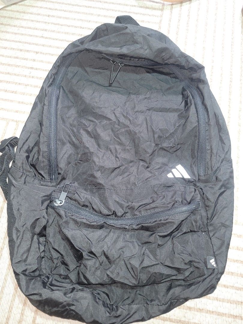 Adidas 35L Lightweight Collapsible Backpack Black (Category: Backpacks) located in Tanay. Submitted by happinessforless (Listing ID 1440826841, Image 3). Description: - Adidas Backpack - 35L Capacity - Lightweight and Foldable - Ideal for Travel or Everyday Use - Zippers in excellent working condition - Made from eco friendly material - This is a compact backpack - Clean interior - Ready for its new owner.