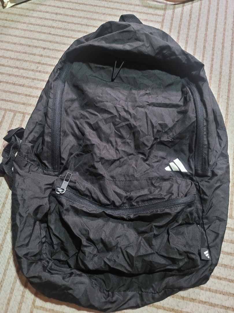 Adidas 35L Lightweight Collapsible Backpack Black (Category: Backpacks) located in Tanay. Submitted by happinessforless (Listing ID 1440826841, Image 2). Description: - Adidas Backpack - 35L Capacity - Lightweight and Foldable - Ideal for Travel or Everyday Use - Zippers in excellent working condition - Made from eco friendly material - This is a compact backpack - Clean interior - Ready for its new owner.