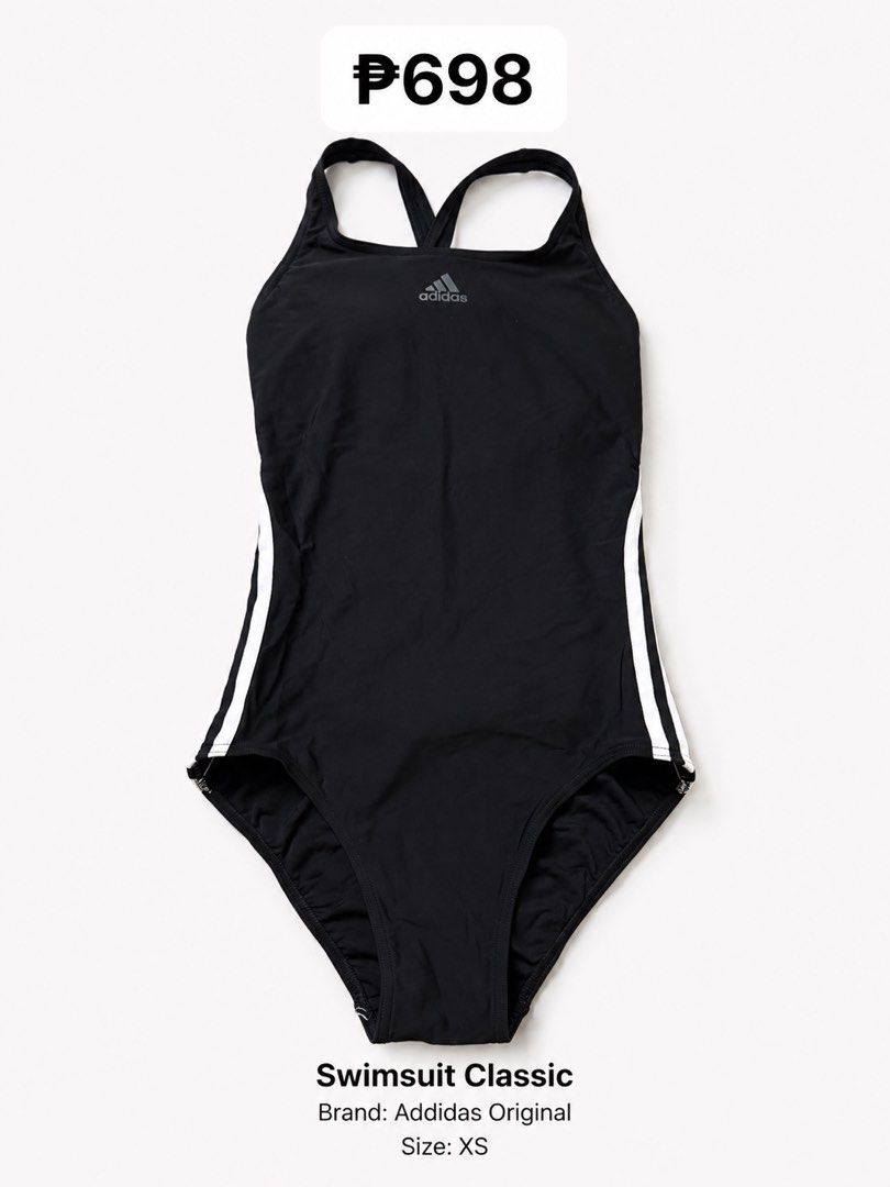 Adidas Classic Black One-Piece Swimsuit (Category: Bikinis & Swimsuits) located in Quezon City. Submitted by poshforward (Listing ID 1440850003, Image 2). Description: - Classic black Adidas one-piece swimsuit - Iconic three stripes on the sides - Cross-back straps for a secure fit - Ideal for swimming or lounging - Size XS.
